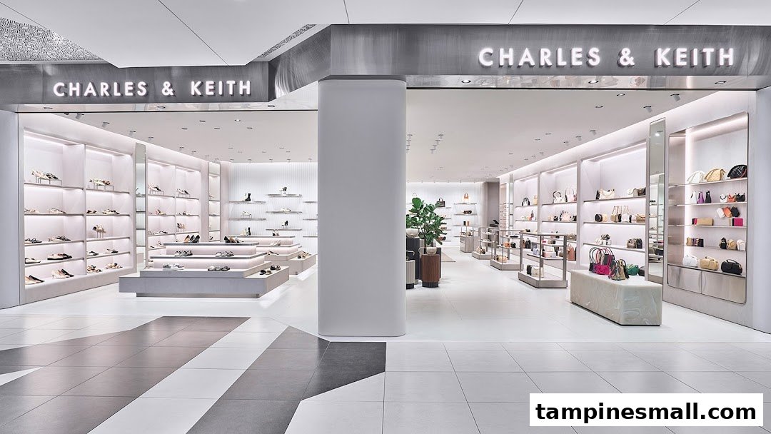 The bright, modern entrance of CHARLES & KEITH, showcasing stylish shoes and handbags on illuminated displays.