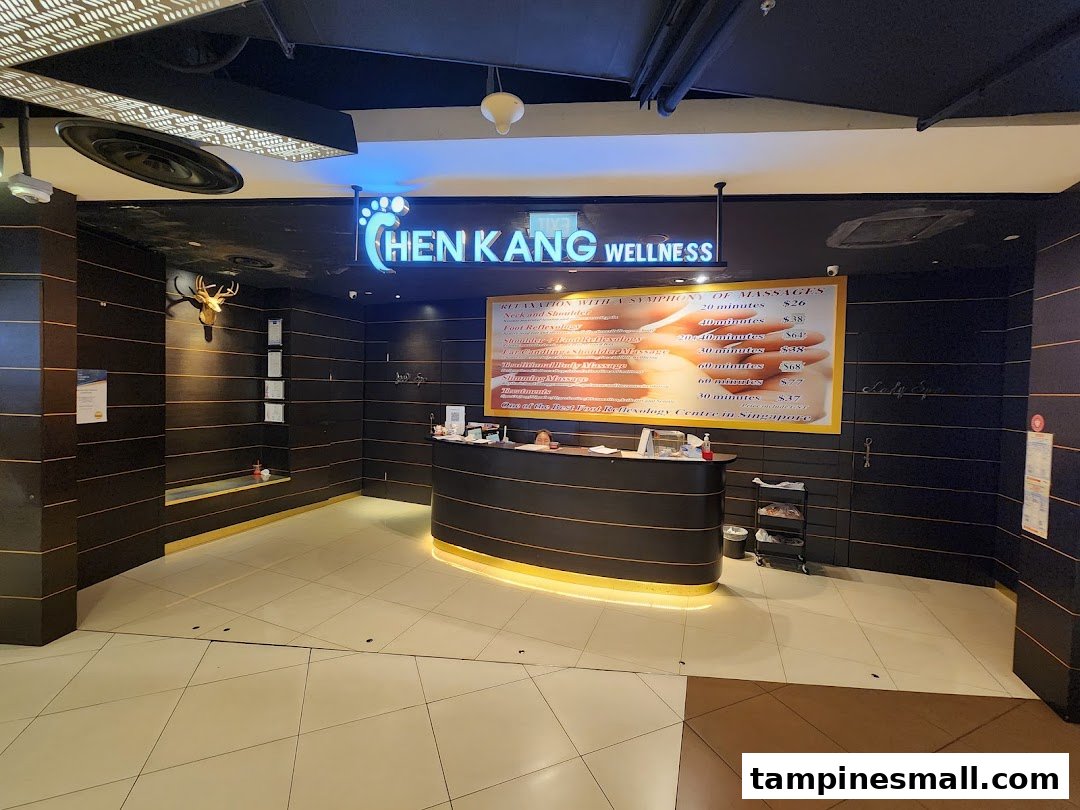 A prominent display of massage and wellness service prices at Chen Kang Wellness.
