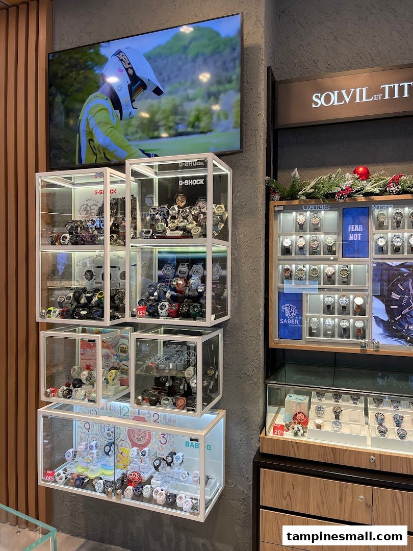 Interior of City Chain watch shop showcasing diverse watch collections including G-Shock and Solvil et Titus.
