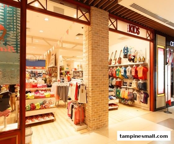 Bright and inviting entrance of Cotton On Kids store, showcasing colorful children's apparel and accessories.