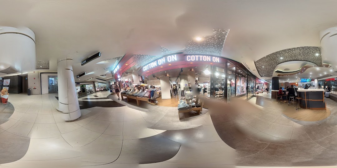 The vibrant entrance of Cotton On Tampines, showcasing its wide range of trendy apparel and accessories.
