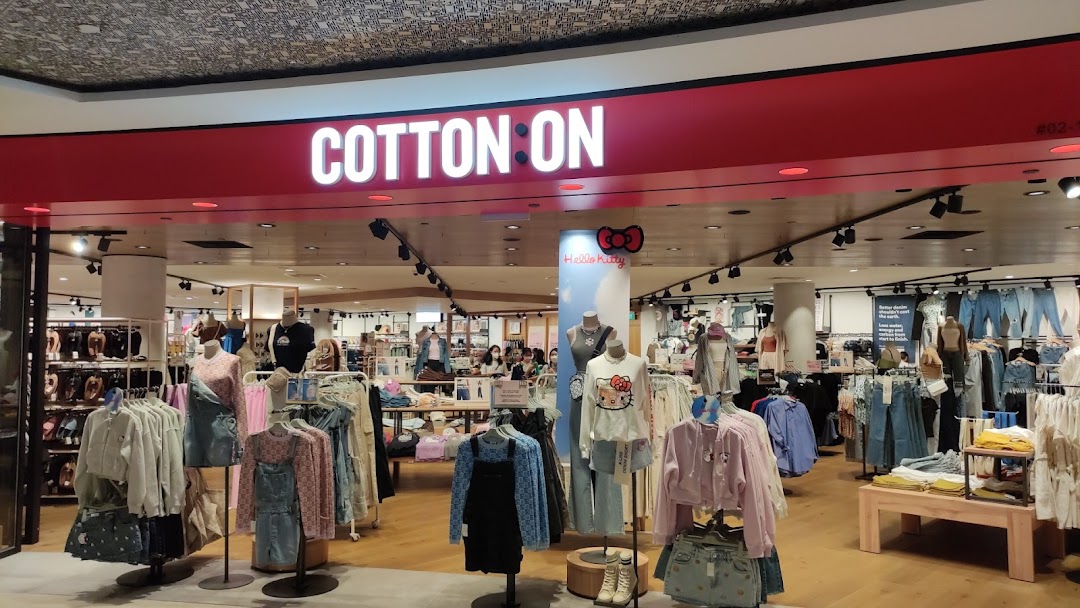 The vibrant entrance of Cotton On Tampines, showcasing a wide array of trendy apparel and accessories.