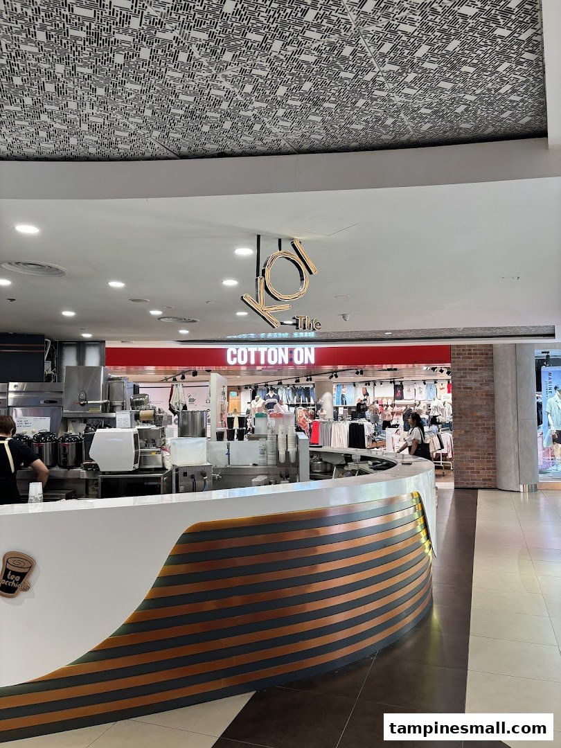 The entrance of Cotton On Tampines, with a KOI The bubble tea counter in the foreground.