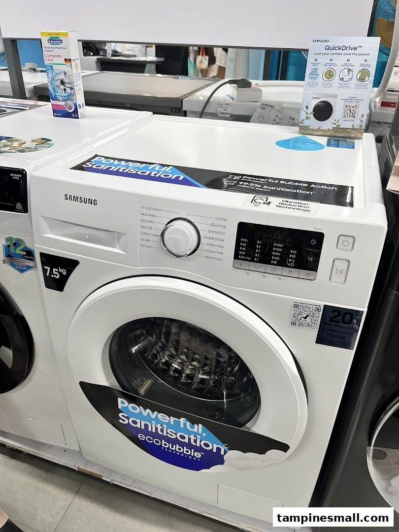A white Samsung washing machine with 'Powerful Sanitisation' and 'ecobubble' features on display.
