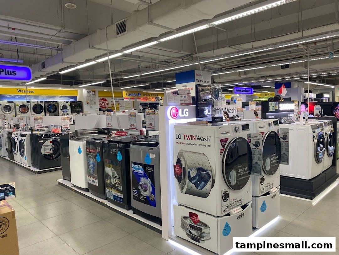 Interior view of COURTS Tampines Mall, showcasing a wide selection of washing machines and home appliances.