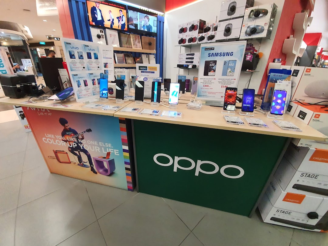 A vibrant display of mobile phones and electronics from brands like Samsung, Vivo, and Oppo at COURTS.