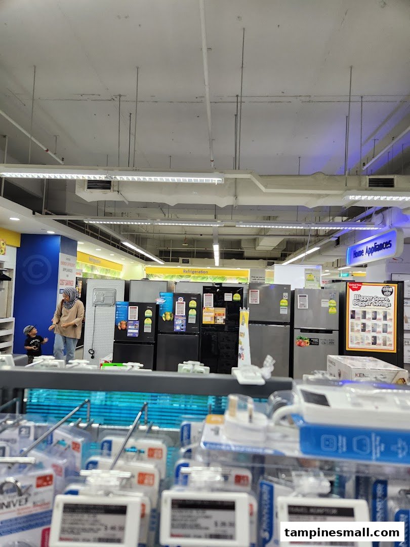 An interior view of COURTS Tampines Mall, showcasing a wide selection of refrigerators and home appliances.