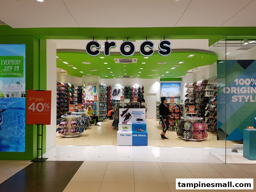 The vibrant Crocs store entrance showcasing colorful footwear displays and a welcoming interior.