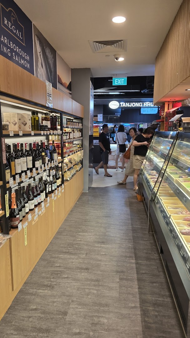 Interior view of Cut Butchery, showcasing shelves of gourmet products, a meat display, and customers browsing.