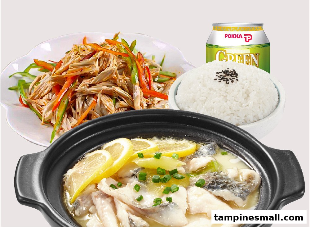 A delicious meal set featuring lemon fish, a vegetable side, rice, and a drink.
