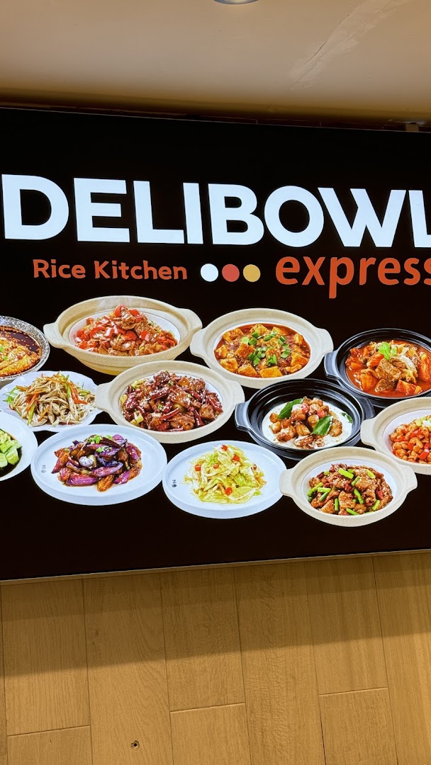 A vibrant display board showcasing various delicious dishes from Delibowl Rice Kitchen.