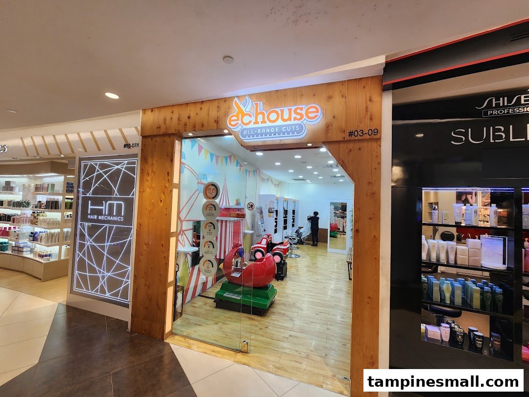 The vibrant entrance of EC House All Range Cuts, a hair salon featuring a playful, kid-friendly interior.