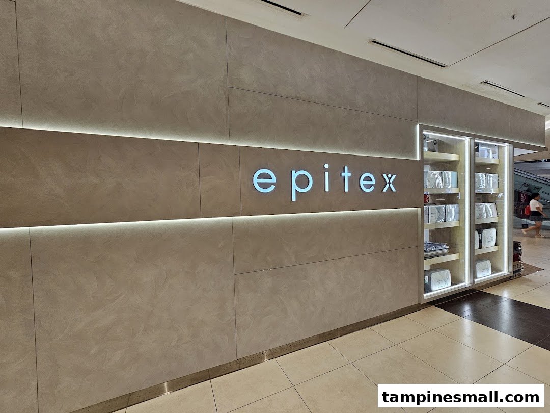 The Epitex shop front features a modern design with illuminated signage and a product display cabinet.
