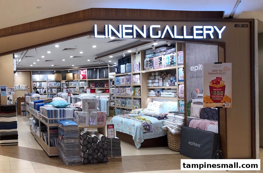 The Epitex Linen Gallery shop front displays a wide range of bedding, pillows, and home textiles, including a styled bed.