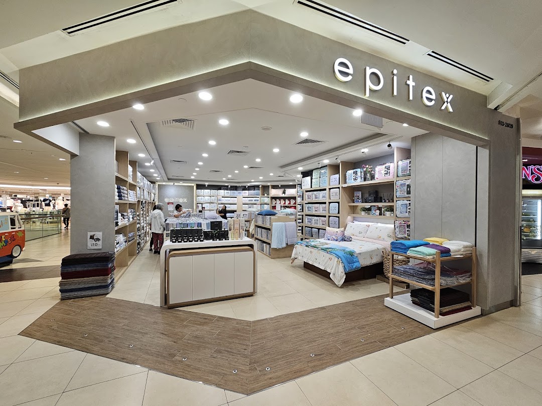 The inviting entrance of Epitex, a home textiles store, showcasing a wide array of bedding and bath essentials.