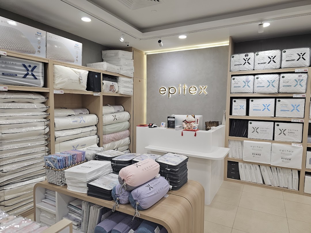 Interior view of Epitex store showcasing a wide range of bedding products and the service counter.