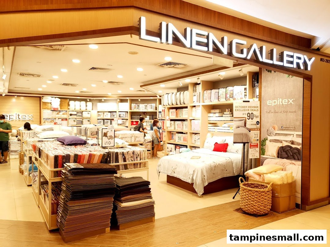 An interior view of Epitex Linen Gallery, showcasing a wide range of bedding, pillows, and home textiles.