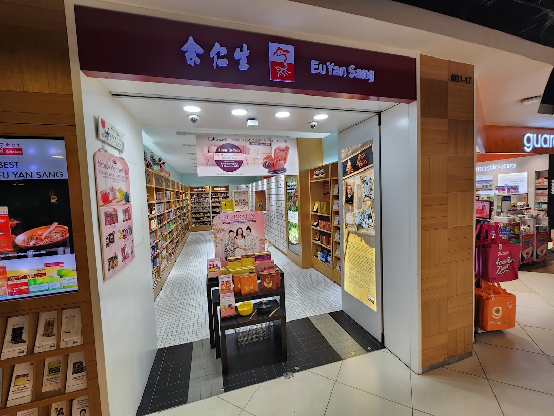 The inviting shop front of Eu Yan Sang, showcasing its traditional Chinese medicine and wellness products.