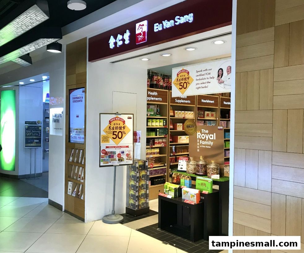 The shop front of Eu Yan Sang, showcasing its entrance, interior shelves, and promotional displays.