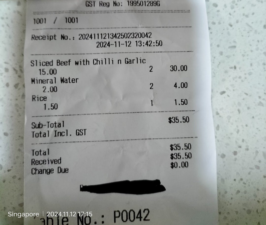A detailed receipt from Express Teppan-Yaki showing purchased food and beverage items with prices.