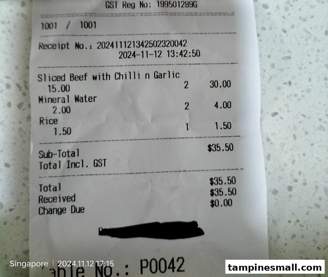 A detailed receipt from Express Teppan-Yaki showing purchased food and beverage items with prices.