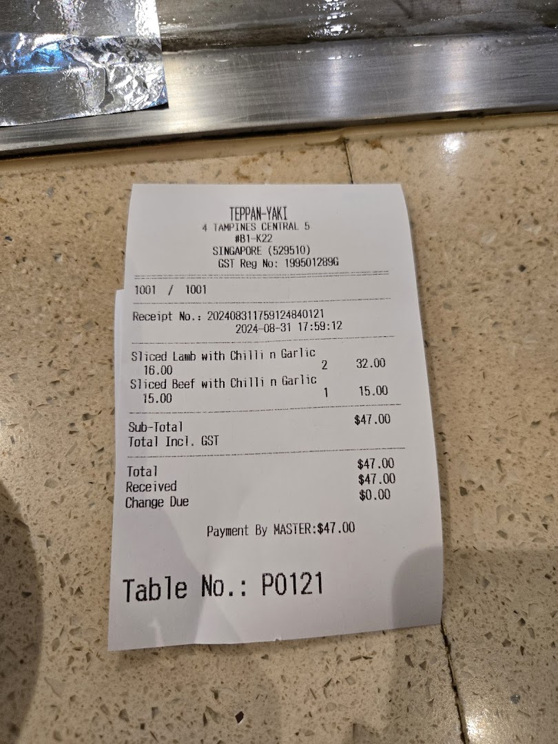 A detailed receipt from Express Teppan-Yaki showing a food order with item names and prices.