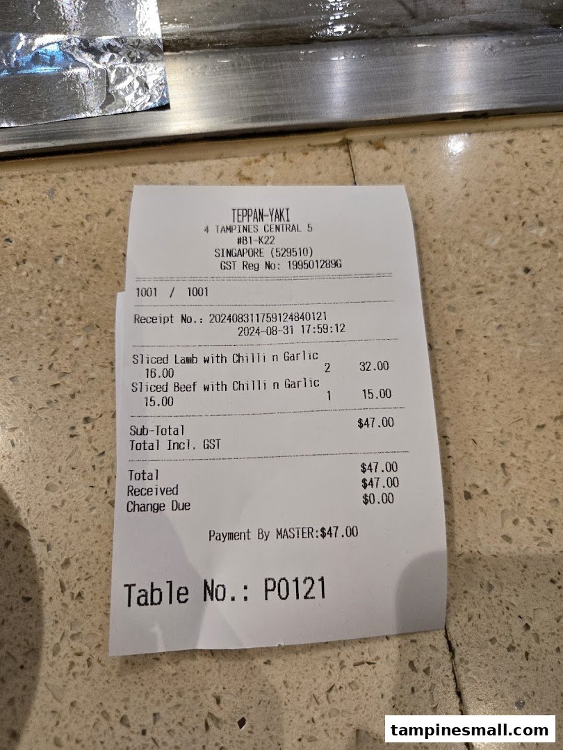 A detailed receipt from Express Teppan-Yaki showing a food order with item names and prices.