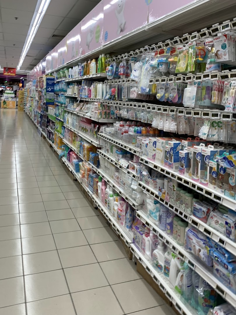 An aisle in FairPrice Tampines Mall stocked with a wide range of baby care products and essentials.