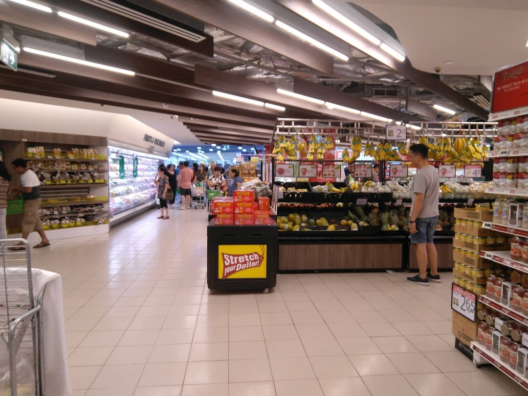 Shoppers browse fresh produce and groceries inside FairPrice Tampines Mall, a well-stocked supermarket.