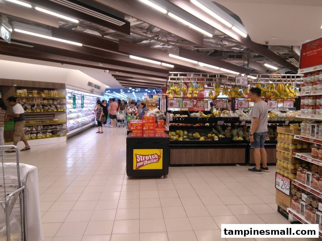 Shoppers browse fresh produce and groceries inside FairPrice Tampines Mall, a well-stocked supermarket.