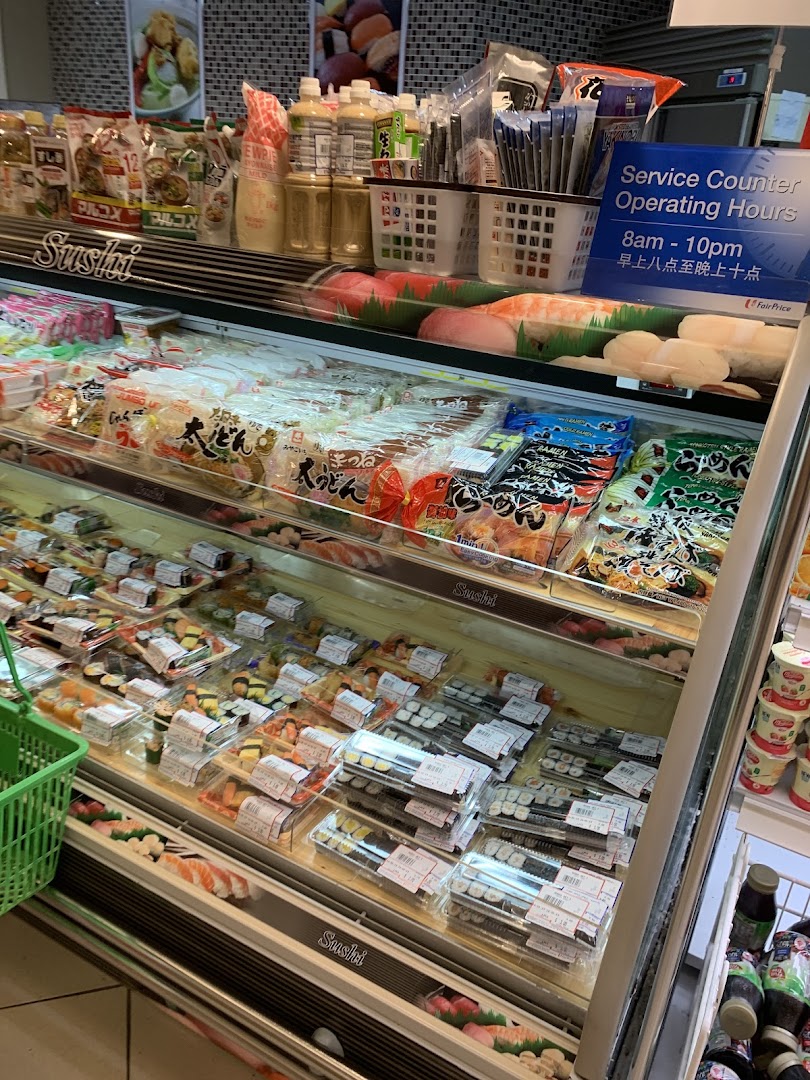 A refrigerated display case at FairPrice Tampines Mall showcasing pre-packaged sushi and Japanese food items.