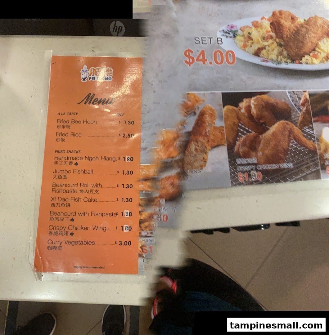 A menu board for Fei Siong showcasing a variety of fried snacks and main dishes with prices.