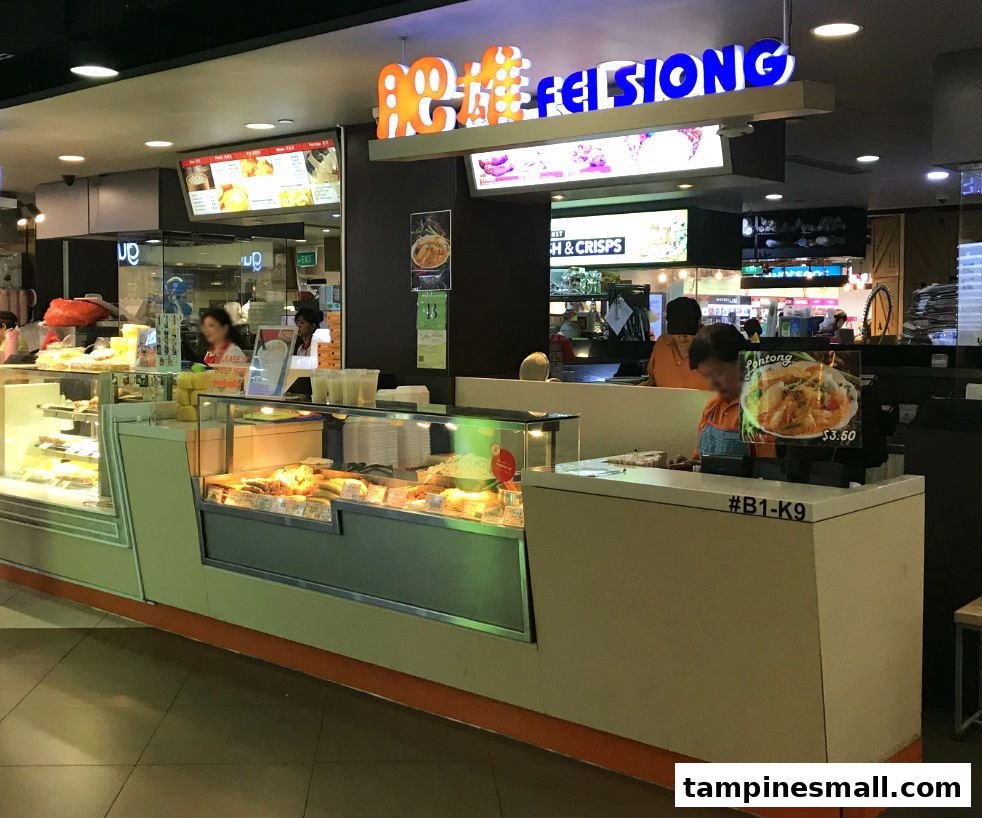 Fei Siong food stall counter with display cases of various local dishes.