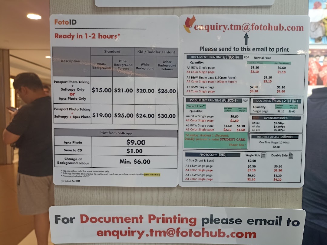 A detailed price list for FotoHub's photo, printing, scanning, lamination, and internet services.