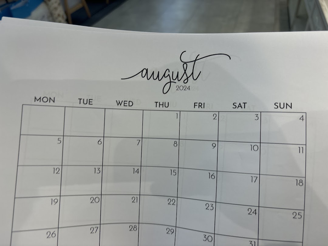 Close-up of an August 2024 calendar page, likely a product or display from FotoHub.