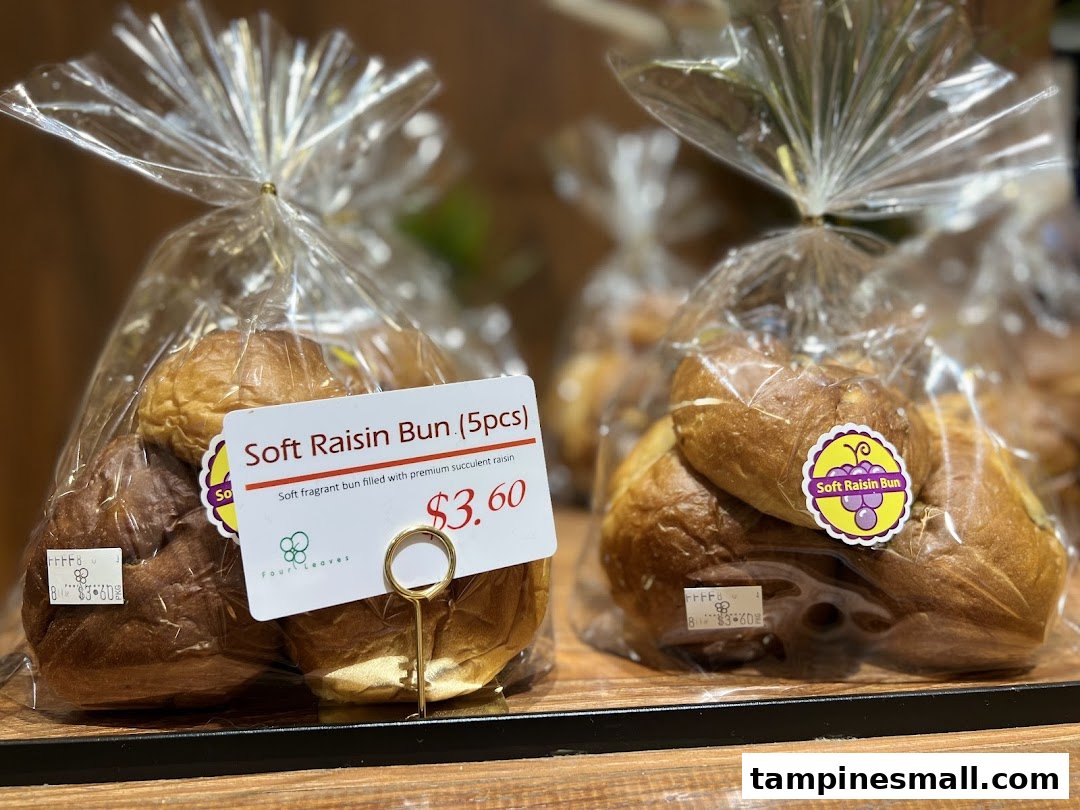 Bags of Soft Raisin Buns from Four Leaves bakery, priced at $3.60 per pack.