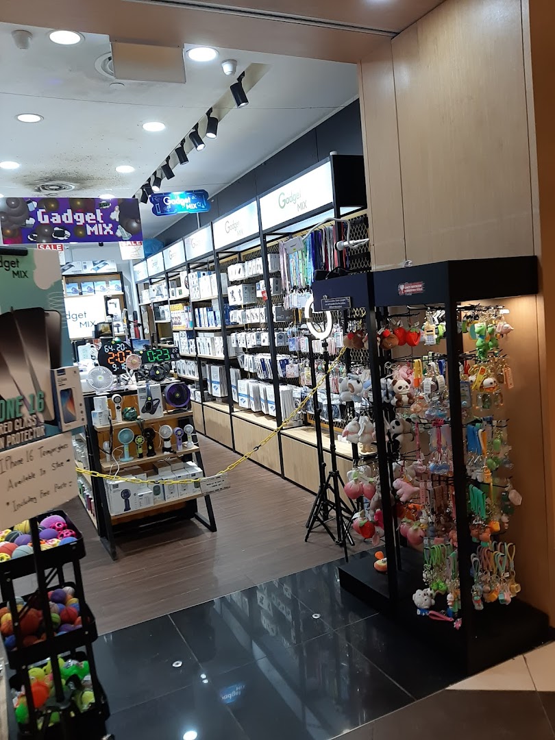 View of Gadget Mix shop entrance, showcasing electronic accessories and tech gadgets inside.