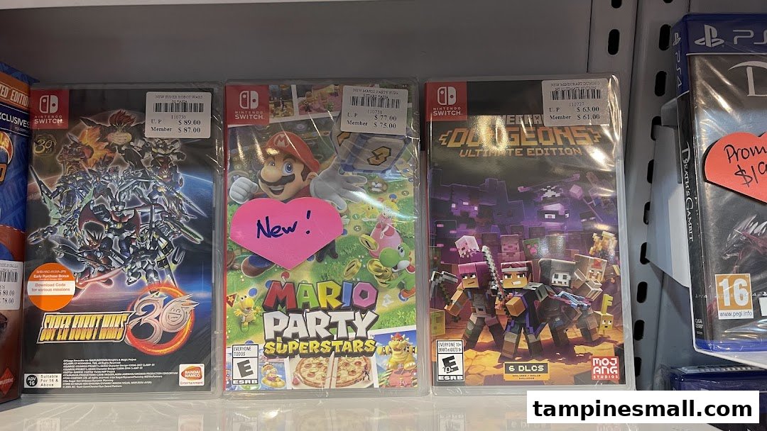Close-up view of Nintendo Switch game cases, including Mario Party Superstars and Minecraft Dungeons, on a retail shelf.