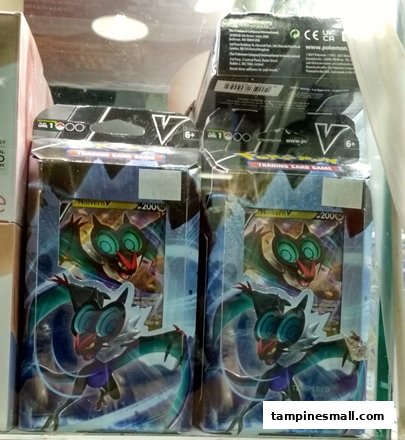Two packaged Pokémon Trading Card Game products featuring Noivern V on display.