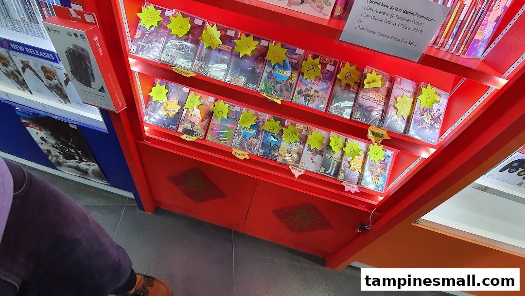 A vibrant display of Nintendo Switch games on promotion at GameXtreme Tampines.