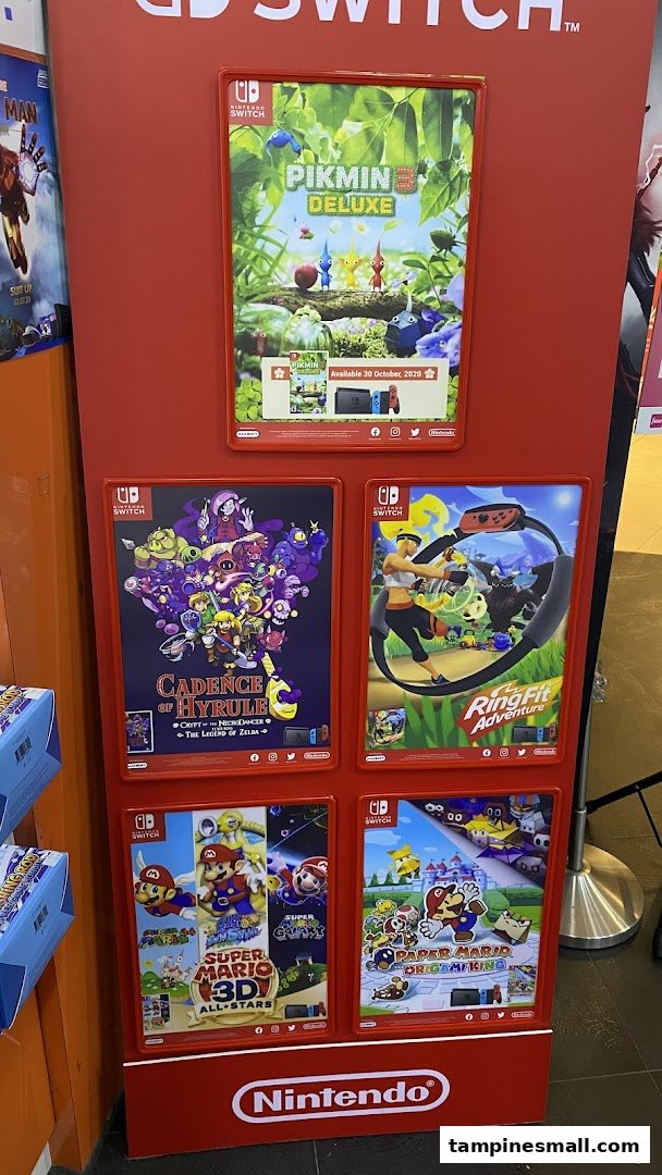 A vibrant Nintendo Switch game display featuring popular titles like Pikmin 3 Deluxe and Super Mario.
