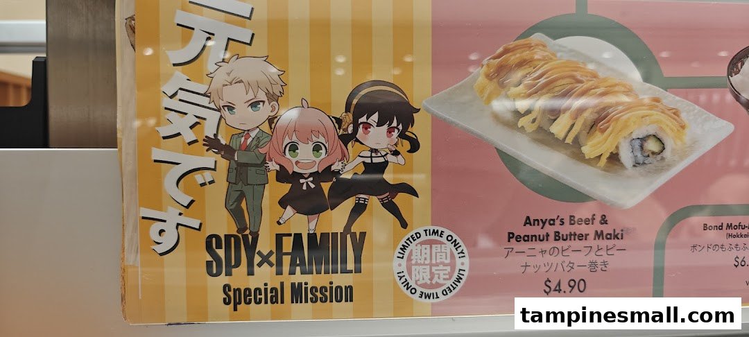 A promotional menu board at Genki Sushi featuring Spy x Family collaboration items and prices.