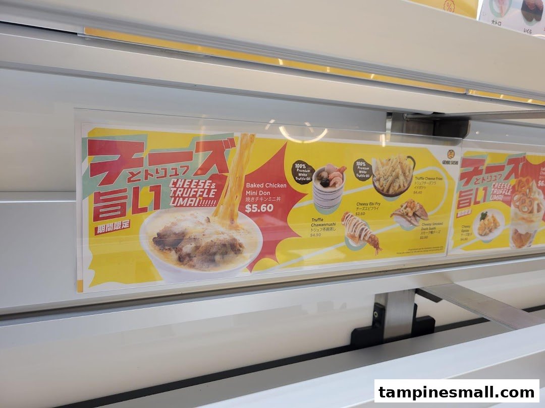 A promotional display showcasing Genki Sushi's limited-time cheese and truffle themed menu items.