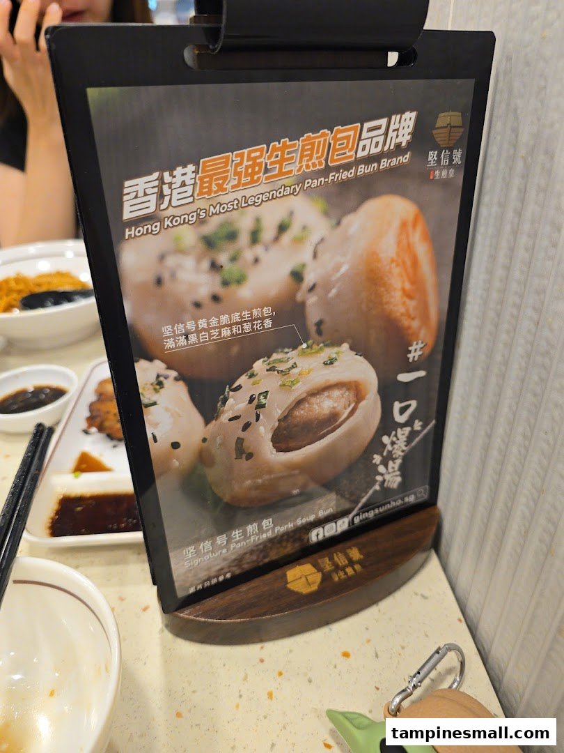 A table-top display advertising Ging Sun Ho's signature pan-fried pork soup buns.
