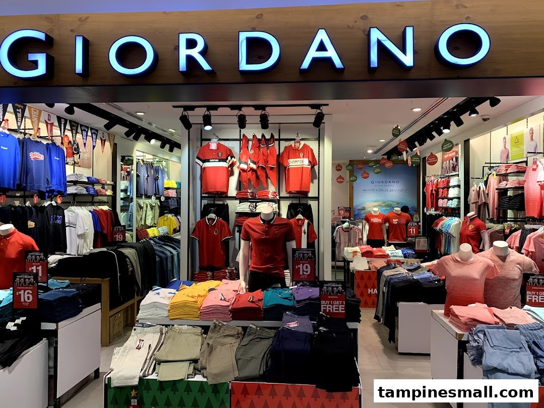 The Giordano shop entrance showcases a wide selection of casual apparel and holiday decorations.