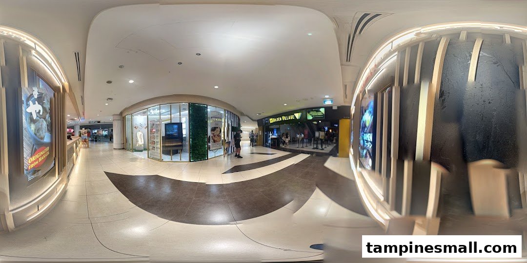 View of Golden Village cinema entrance with queue barriers in a brightly lit mall corridor.