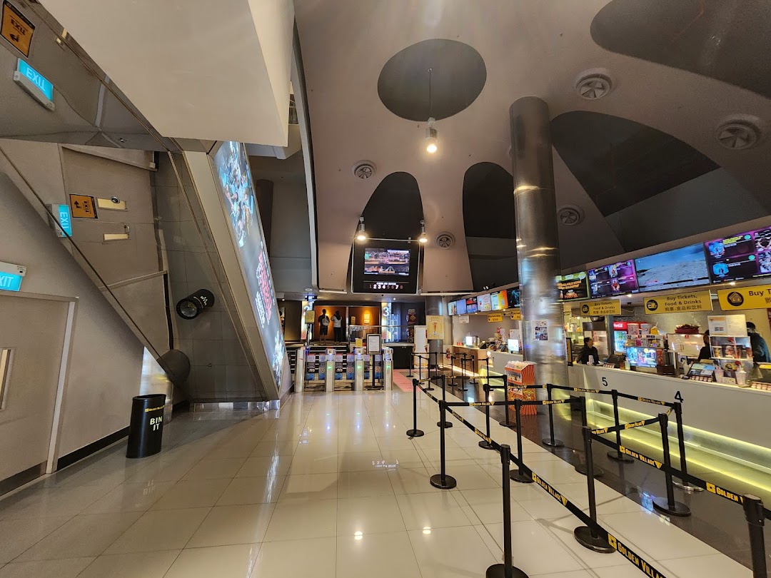 Interior view of Golden Village Tampines cinema lobby with concession stands and ticket counters.