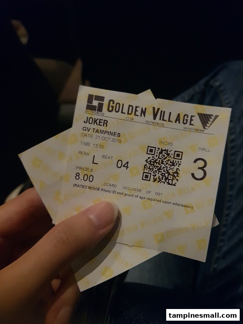 A hand holding a Golden Village movie ticket for 'Joker' at GV Tampines.