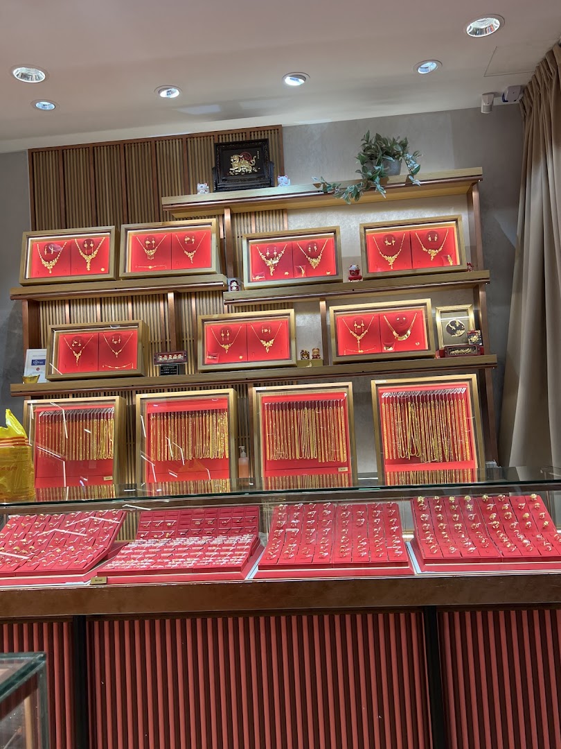 An interior view of Goldheart Jewelry showcasing a wide array of gold necklaces and rings.