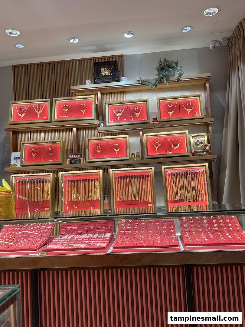 An interior view of Goldheart Jewelry showcasing a wide array of gold necklaces and rings.